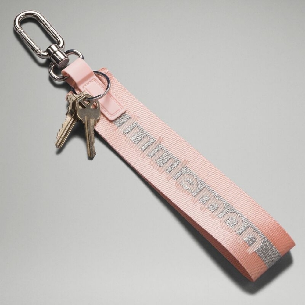 Lululemon Never Lost Pink Mist, silver logo keychain lanyard